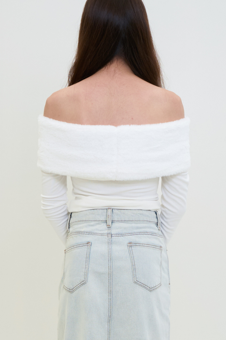 CAPUCINE top - Women's white blouse with fur and wool. back image. Women wearing a white off-shoulder top and light blue jeans against a plain background