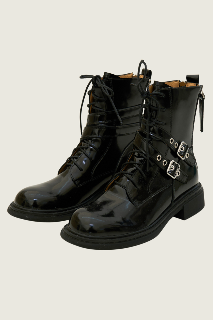 Black patent leather boots with buckles. Black high-top boots with zippers. Women’s Chelsea boots, timberland boots, military boots, heels boots, black boots with zippers. Leather boots. YSL