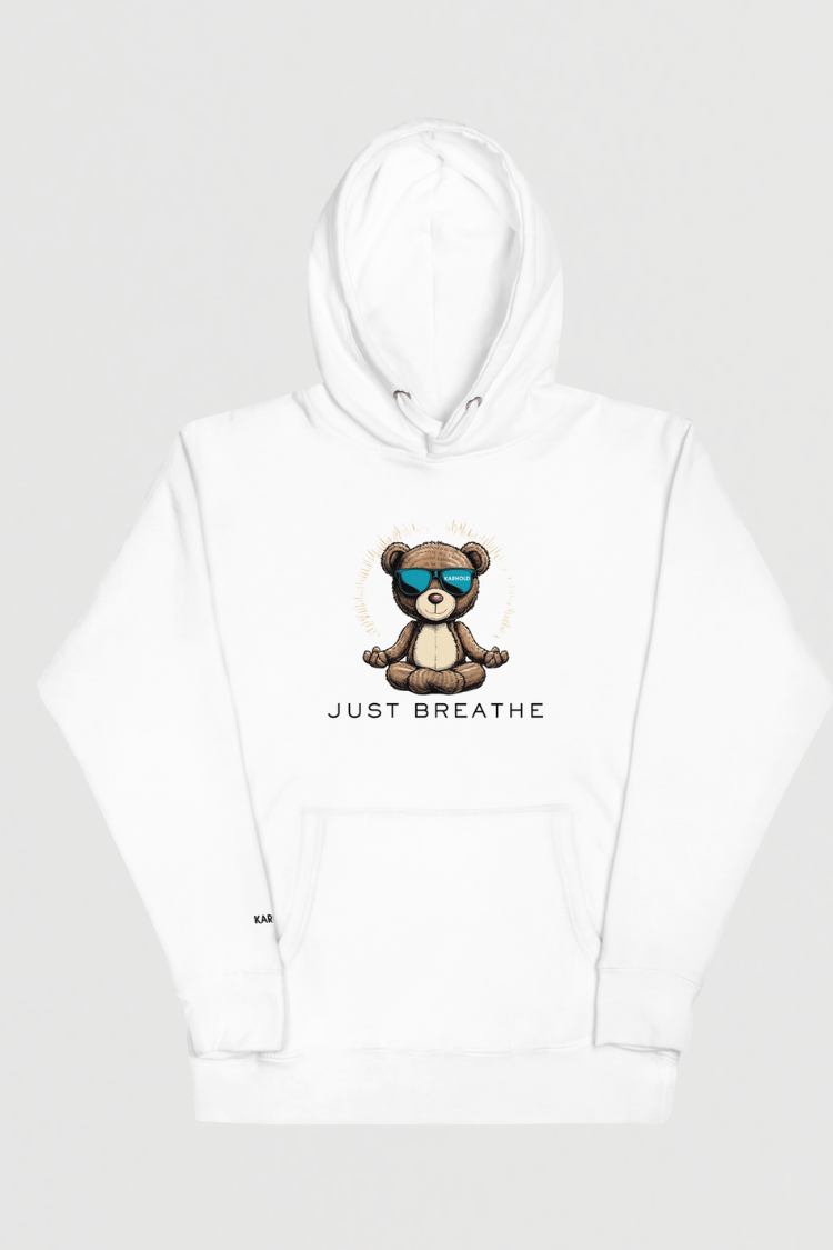 White hoodie with a bear graphic and 'Just Breathe' text on a white fabric. Unisex hoodie Men’s hoodie Women’s hoodie white hoodie with a bear graphic and 'Just Breathe' text. 100% cotton. Front image