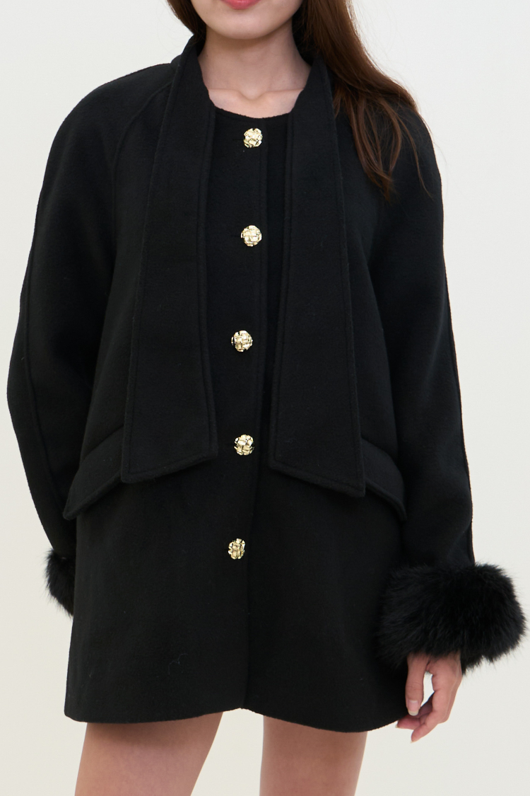 Black coat with fur cuffs and gold buttons. NOOR coat Women’s back coat. Wool, Combined Cotton, Vegan Fur. Front image.