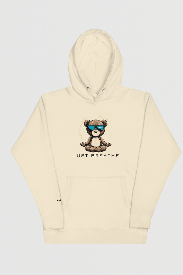 Unisex hoodie Men’s hoodie Women’s hoodie Beige hoodie with a bear graphic and 'Just Breathe' text. 100% cotton. 
